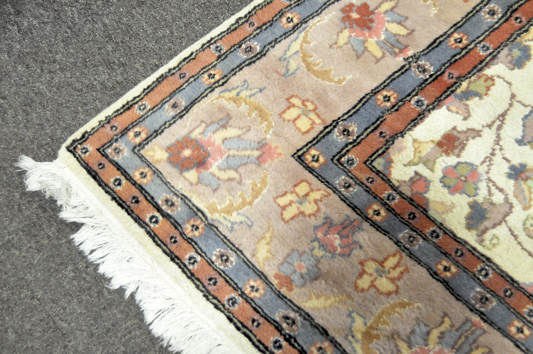 A large 20th century Chinese style carpet with a pink ground border of lotus flowers - Image 2 of 2