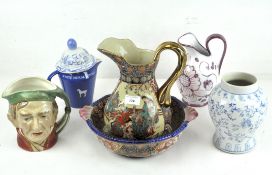 A selection of ceramics including an Italian white glazed jug with pink details