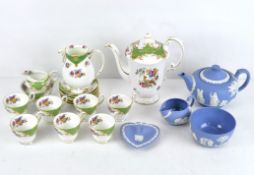 A vintage Paragon Rockingham part coffee set with seven cups and saucers,