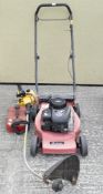 A Sovereign lawn mower with a Briggs & Stratton engine,