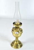A vintage Duplex brass oil lamp, with original glass funnel,