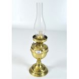 A vintage Duplex brass oil lamp, with original glass funnel,