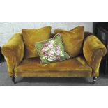 A Victorian drop arm sofa two seater sofa, upholstered in mustard coloured cord,