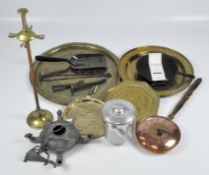 A selection of assorted brass and other metalware, including various chargers,