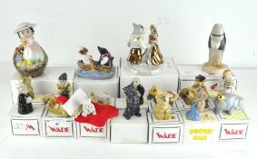 A collection of twenty Wade ceramic figures, various designs and models,