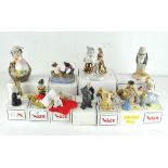 A collection of twenty Wade ceramic figures, various designs and models,