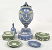 A Wedgwood blue and white Jasperware urn shaped commemorative pot pourri lidded vase for the 1981