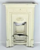 An early 20th century white painted cast iron fire place,