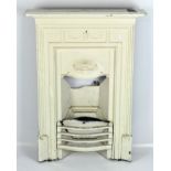 An early 20th century white painted cast iron fire place,