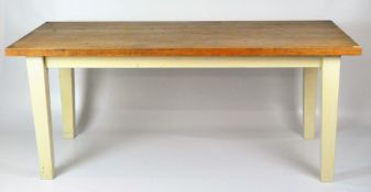 A 20th century oak kitchen table, the square tapered legs painted cream,