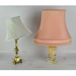 Two table lamps, one with stone base and pink shade, height 48cm,