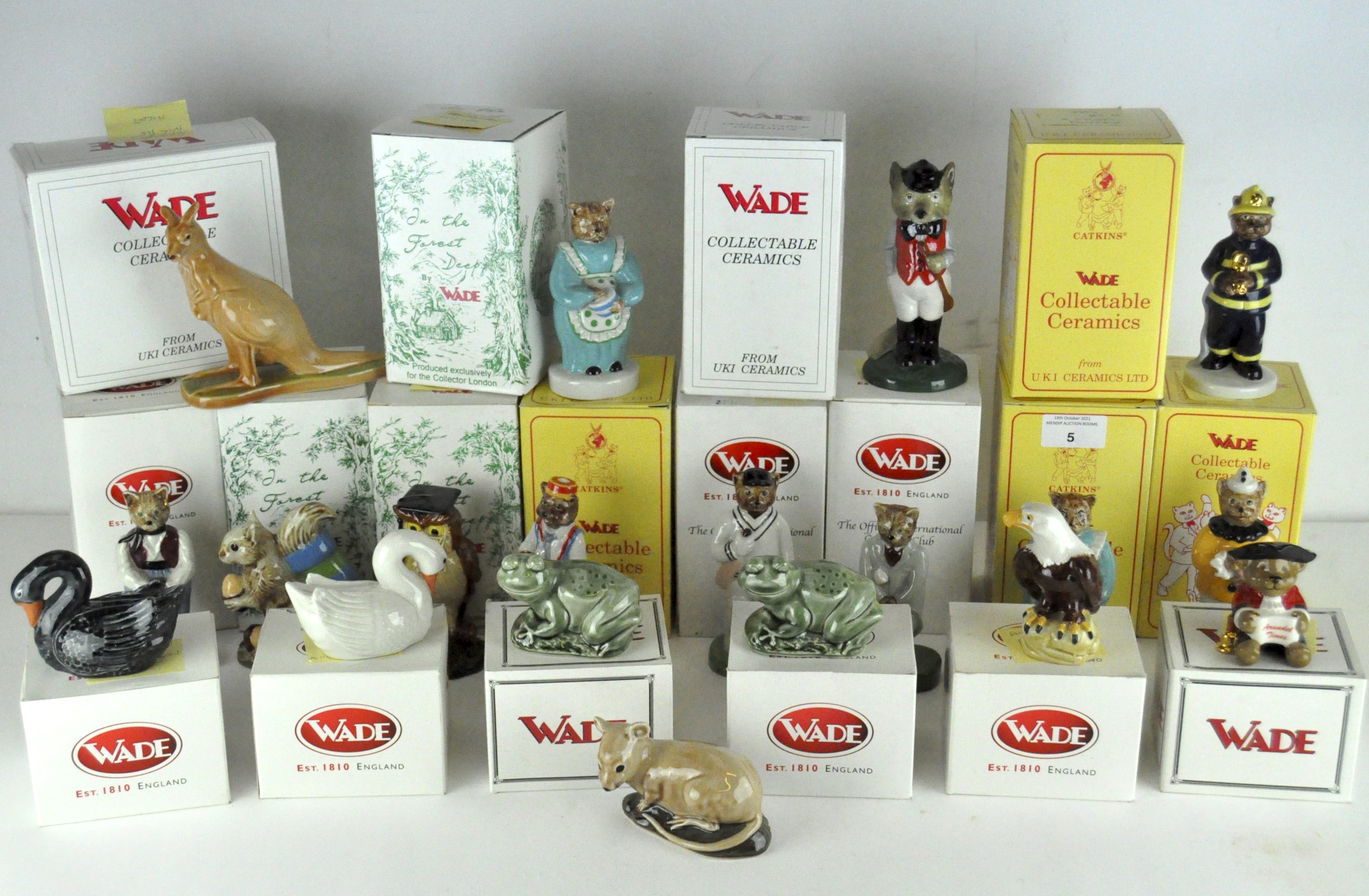 A collection of nineteen Wade ceramic figures, various designs and models,