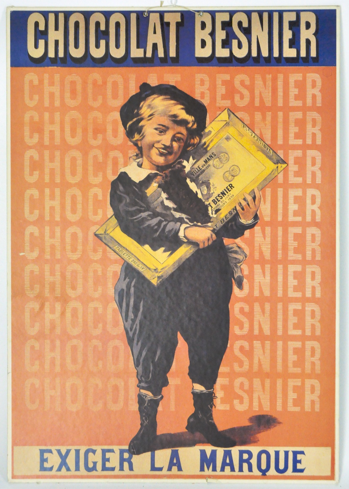 A Chocolate Besnier advert offset print on card featuring a young boy holding a bar of chocolate