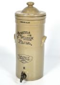 A vintage ceramic water slip, marked 'Cheavins 'Saludor' Filter',
