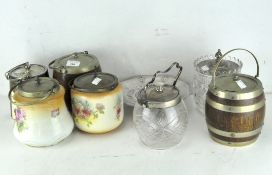 Seven assorted biscuit barrels,