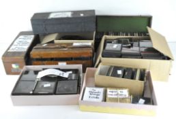 A large collection of photographic slides, depicting a selection of scenes,