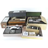 A large collection of photographic slides, depicting a selection of scenes,