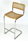 A contemporary Marcel Breuer Cesca style wooden bar stool, with wicker seat and back,