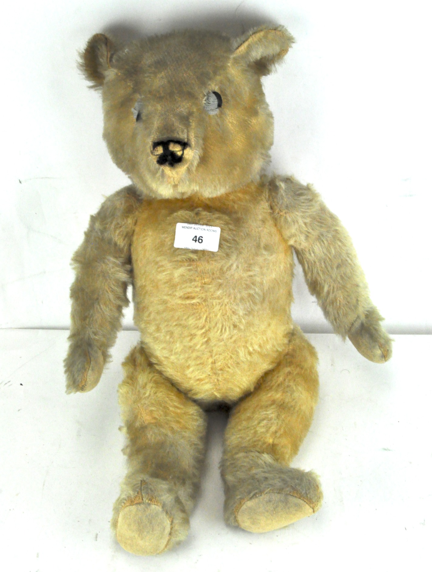 A 20th century mohair teddy bear, with articulated limbs,