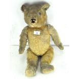 A 20th century mohair teddy bear, with articulated limbs,