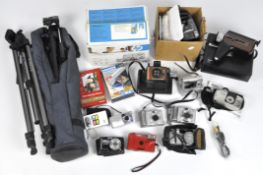 A selection of vintage cameras, including a Polaroid land camera colour swinger II,