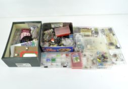 A large box of beads and jewellery making items, including bead boxes,