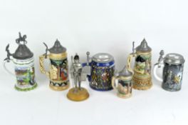 A set of six traditional steins,