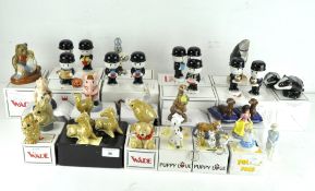 A collection of assorted Wade ceramic figures, various designs and models,