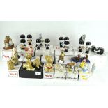 A collection of assorted Wade ceramic figures, various designs and models,