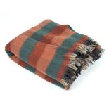 A Scottish woolen Tartan blanket,