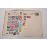 A 'Rocket' stamp album, containing stamps of various designs,