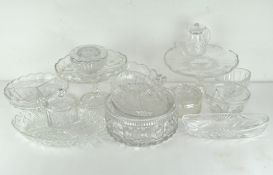 A large selection of glassware, comprising mostly press moulded glassware, including jelly moulds,