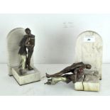 A pair of Art Deco Spelter bookends, depicting dancing couples in period dress, on marble bases,