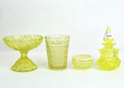 A collection of press-moulded uranium glass