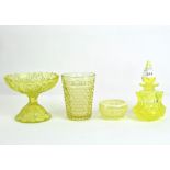 A collection of press-moulded uranium glass