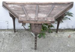 An antique tobacco rolling table,