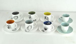 A vintage Suzie Cooper coffee service comprising six cups and saucers decorated with fruits,