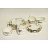 A 'Crown Chateau' china part tea service, comprising cups, saucers, plates, a serving plate,