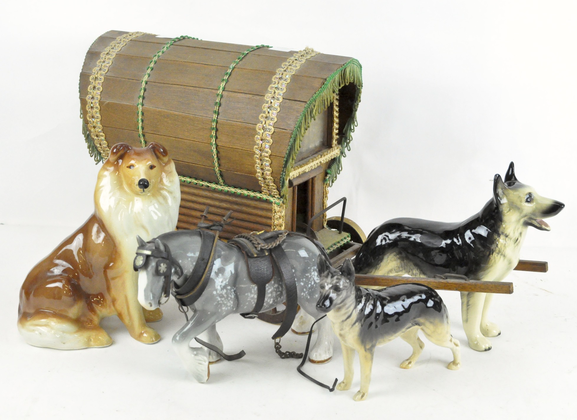 A wooden model traveller's caravan with a Sylvac model shire horse