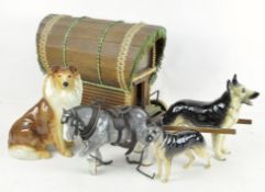 A wooden model traveller's caravan with a Sylvac model shire horse