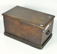 A 19th century stained wooden blanket box, with metal handles,