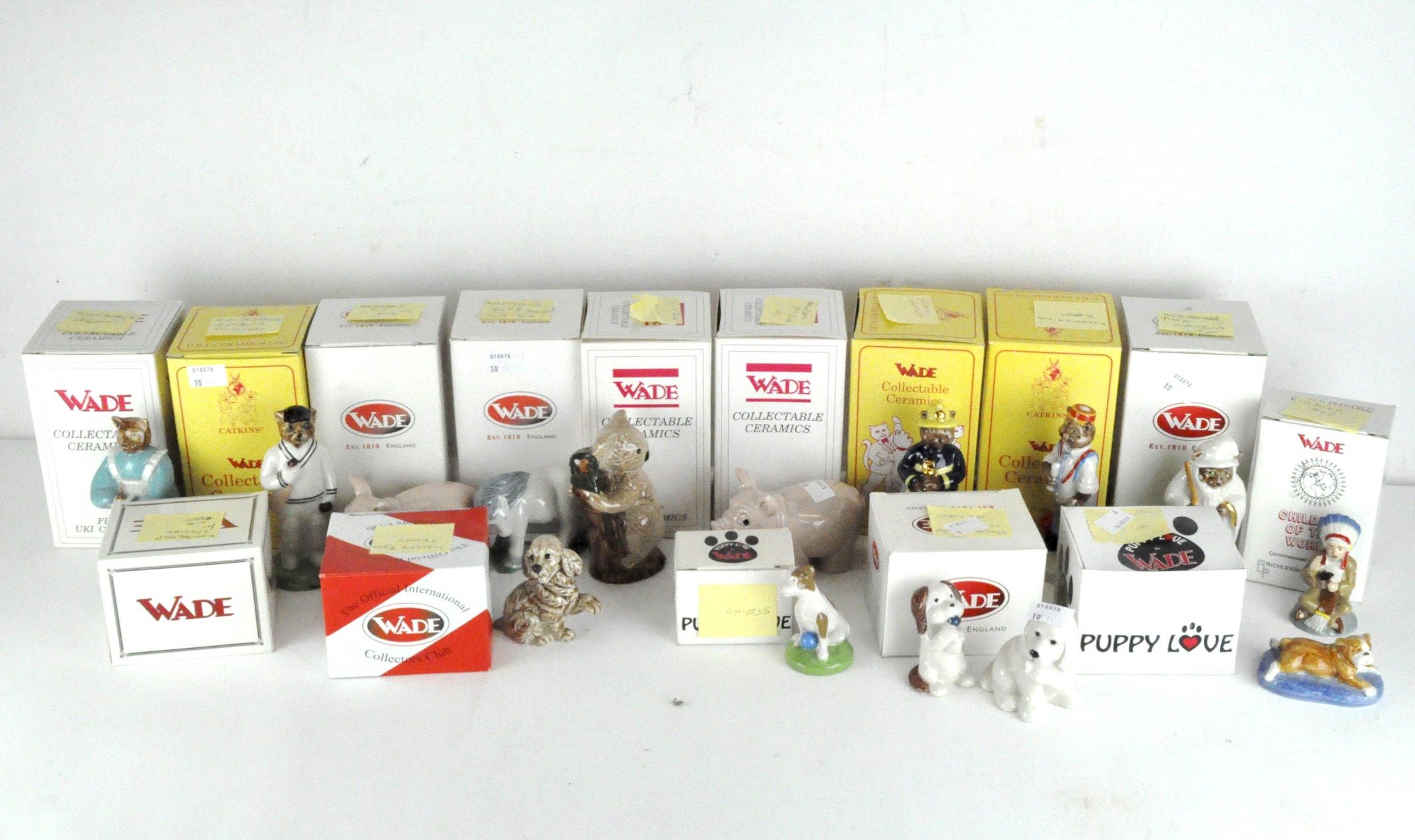 A collection of fifteen Wade ceramic figures, various designs and models,