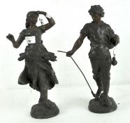 A pair of decorative cast metal French figures, depicting a Farmer with Scythe and a lady,