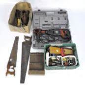 Assorted tools and drills including vintage saws, drill bits, a large Black and Decker drill,