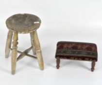 A small early 20th century wooden wooden stool, height 40cm, together with another