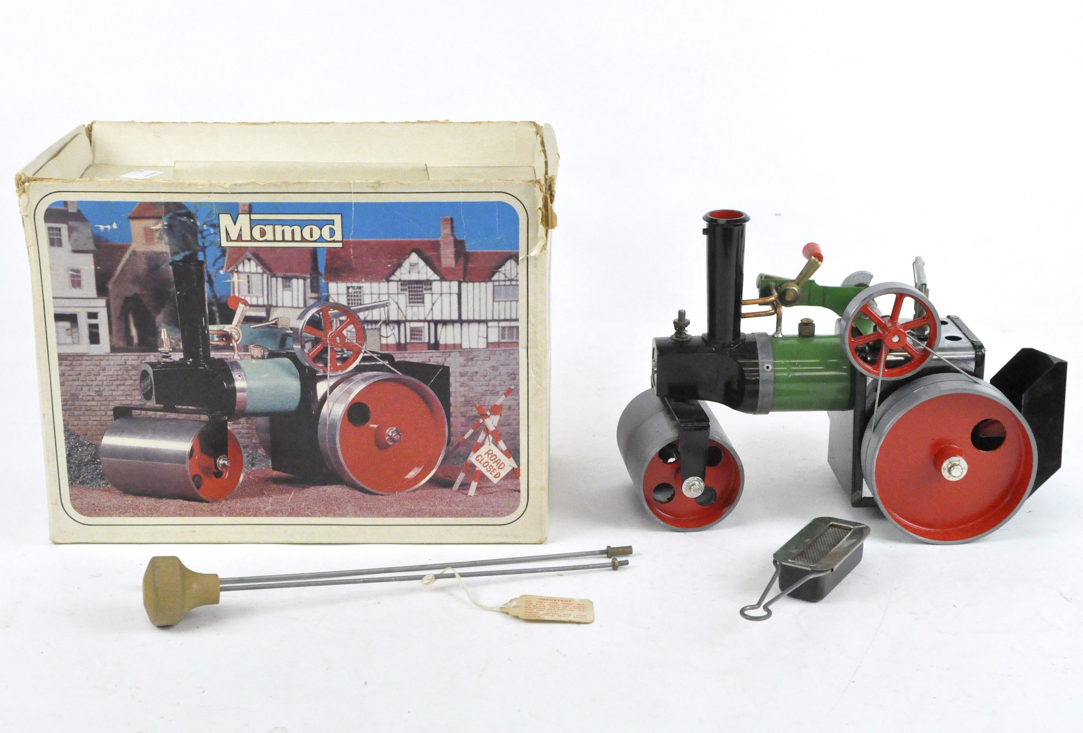 A Mamod S.R. 1a Steam Roller enamelled in green, black and red, in original box