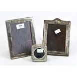 Two silver mounted photo frames, one with foliate borders, hallmarked Chester 1910,