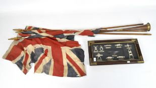 Three vintage Union Jack flags together with a set of assorted shipping knots and a copper horn