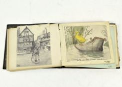 An early 20th century autograph album, including pen and wash studies of dogs by Bun Jowers,