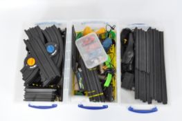 Two boxes of Micro Mania Scalextric, comprising six vehicles, three controllers and track